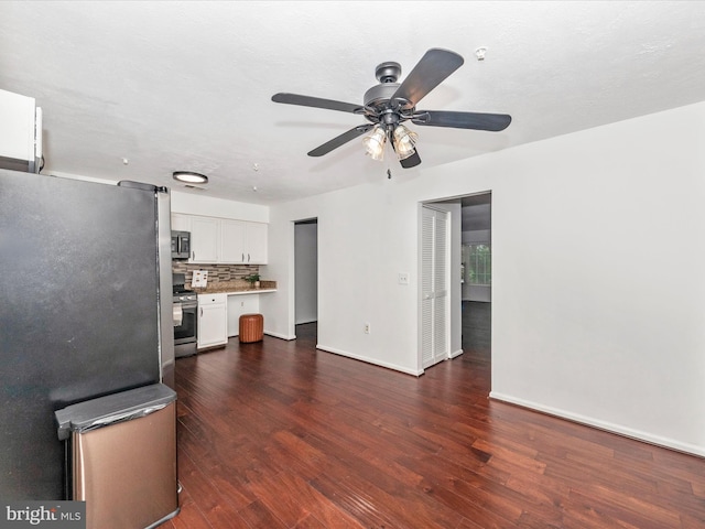 2482 Wentworth Dr Unit 2482, Crofton, MD 21114 - unfurnished living room with a ceiling fan and dark wood-style flooring