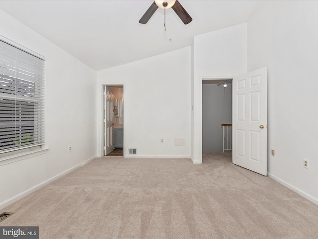 2482 Wentworth Dr Unit 2482, Crofton, MD 21114 - unfurnished bedroom featuring carpet floors, lofted ceiling, and multiple windows