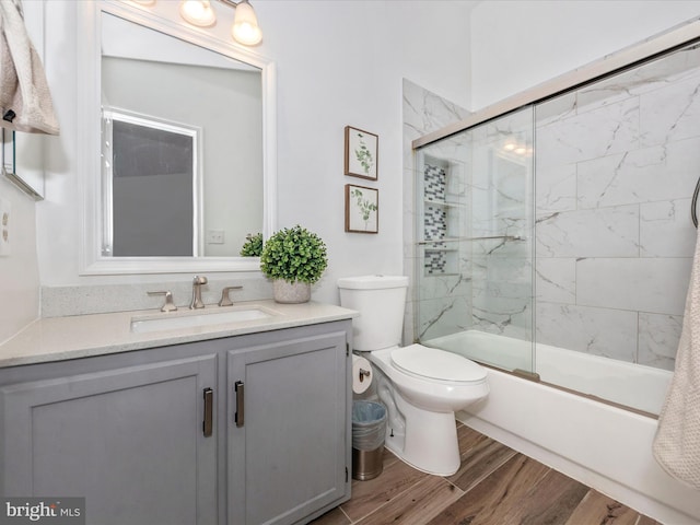 2482 Wentworth Dr Unit 2482, Crofton, MD 21114 - full bath with wood finished floors, vanity, and bath / shower combo with glass door