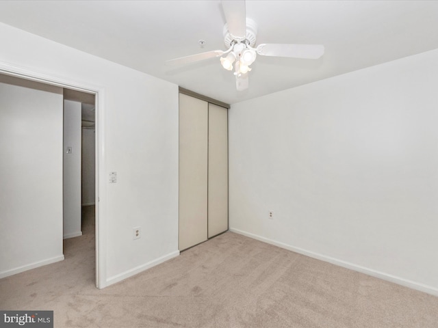 2482 Wentworth Dr Unit 2482, Crofton, MD 21114 - unfurnished bedroom featuring light carpet, a closet, and ceiling fan