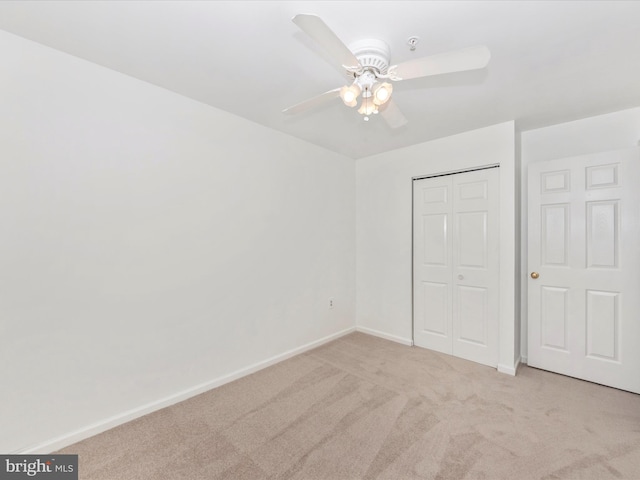 2482 Wentworth Dr Unit 2482, Crofton, MD 21114 - unfurnished bedroom with light carpet, a closet, and a ceiling fan