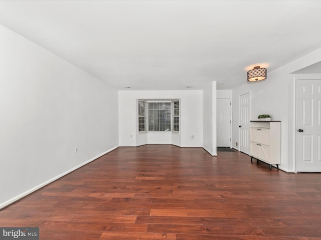 2482 Wentworth Dr Unit 2482, Crofton, MD 21114 - unfurnished living room with wood finished floors and baseboards