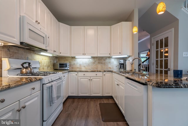 102 Warwick Way N, Wales, PA 19454 - kitchen featuring white appliances, a sink, dark wood-style flooring, white cabinets, and dark stone counters