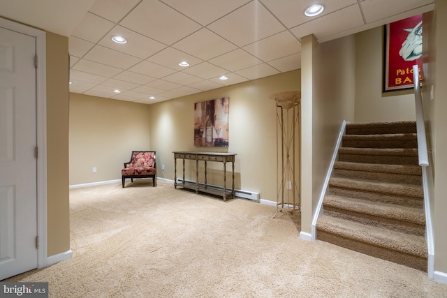 102 Warwick Way N, Wales, PA 19454 - living area with a baseboard heating unit, carpet flooring, stairs, baseboards, and recessed lighting