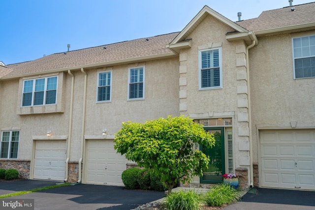 102 Warwick Way N, Wales, PA 19454 - view of property featuring stucco siding and driveway