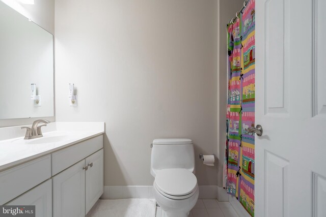 102 Warwick Way N, Wales, PA 19454 - bathroom with vanity, toilet, baseboards, tile patterned floors, and curtained shower