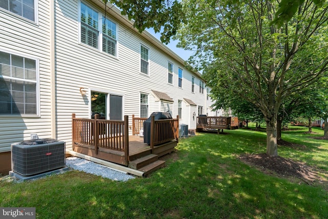 102 Warwick Way N, Wales, PA 19454 - back of house featuring central AC unit, a deck, and a lawn