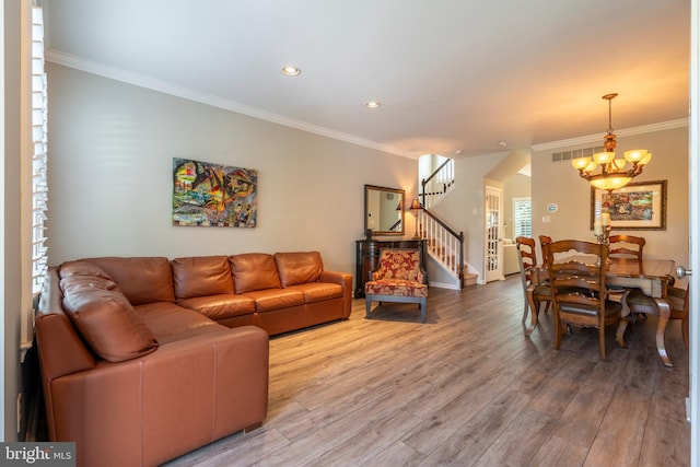 102 Warwick Way N, Wales, PA 19454 - living area featuring stairs, light wood-style flooring, crown molding, recessed lighting, and a chandelier