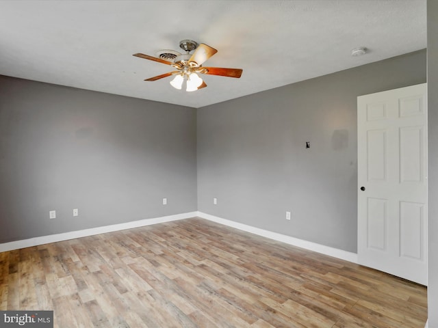 121 Defense Ct, Hedgesville, WV 25427 - empty room featuring ceiling fan, light wood-style flooring, and baseboards