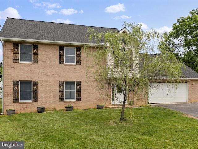 121 Defense Ct, Hedgesville, WV 25427 - view of front of property featuring a front lawn, a shingled roof, asphalt driveway, and brick siding
