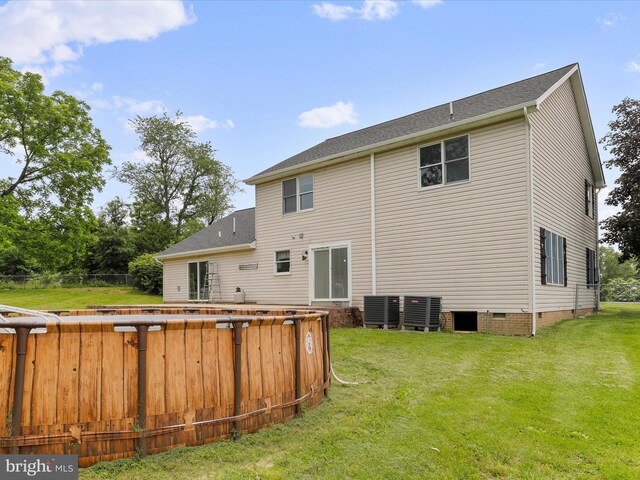 121 Defense Ct, Hedgesville, WV 25427 - rear view of property with crawl space, central air condition unit, and roof with shingles