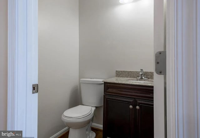 6215 Erland Way, Lanham, MD 20706 - half bath featuring toilet, vanity, and baseboards
