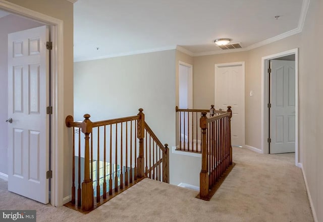 6215 Erland Way, Lanham, MD 20706 - hallway with an upstairs landing, carpet flooring, crown molding, and baseboards