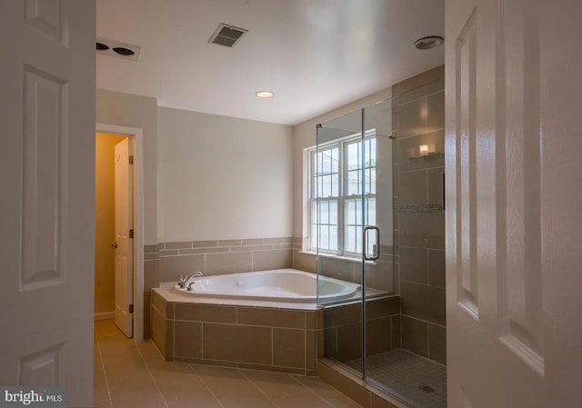 6215 Erland Way, Lanham, MD 20706 - bathroom featuring a garden tub, a stall shower, and tile patterned flooring