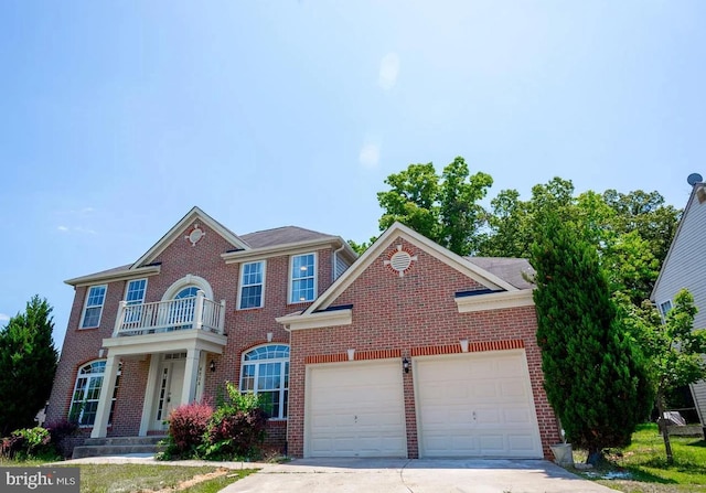 6215 Erland Way, Lanham, MD 20706 - colonial home featuring a garage, brick siding, concrete driveway, and a balcony
