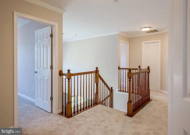 6215 Erland Way, Lanham, MD 20706 - hallway with an upstairs landing, carpet flooring, crown molding, and baseboards