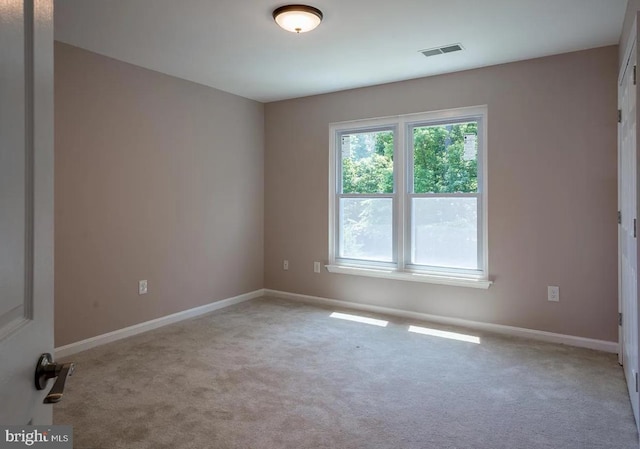 6215 Erland Way, Lanham, MD 20706 - carpeted empty room with baseboards