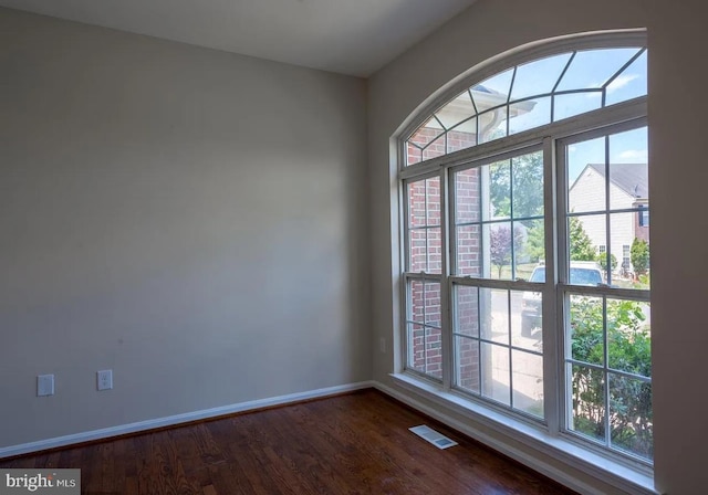 6215 Erland Way, Lanham, MD 20706 - unfurnished room featuring baseboards and dark wood-style floors