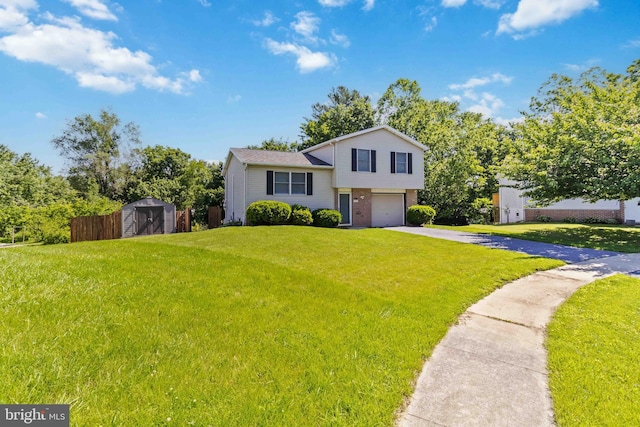 8892 Mckinley Ct, Hummelstown, PA 17036 - split level home featuring an attached garage, driveway, and brick siding