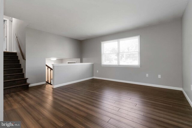 8892 Mckinley Ct, Hummelstown, PA 17036 - empty room with dark wood-style floors and baseboards