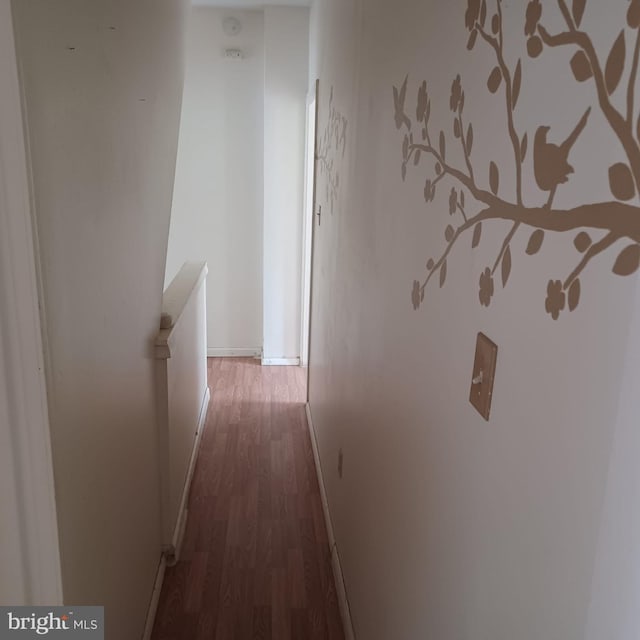 617 Oak St, Allentown, PA 18102 - corridor featuring wood finished floors, baseboards, and an upstairs landing