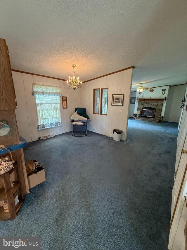 205 Jacob Dr, Moorefield, WV 26836 - unfurnished room with carpet flooring, a textured ceiling, crown molding, a chandelier, and a fireplace