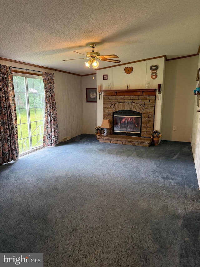 205 Jacob Dr, Moorefield, WV 26836 - unfurnished living room featuring carpet, a textured ceiling, a stone fireplace, ornamental molding, and a ceiling fan