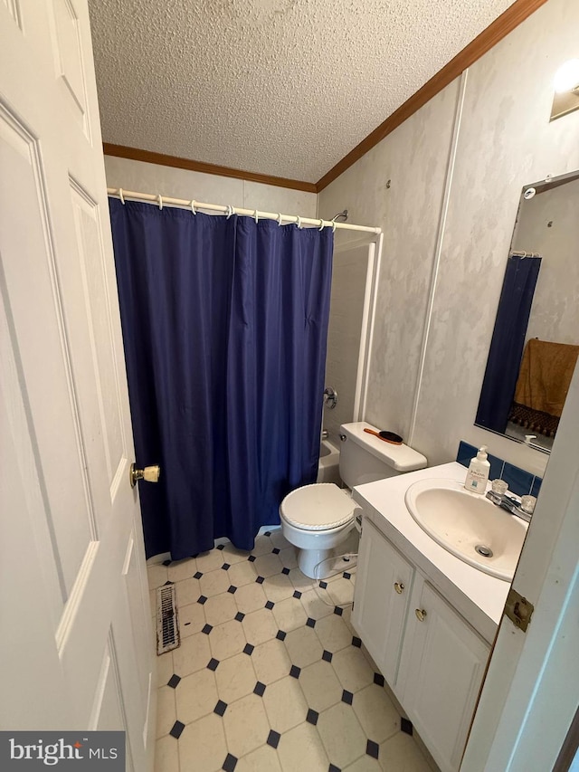 205 Jacob Dr, Moorefield, WV 26836 - bathroom featuring a textured ceiling, crown molding, tile patterned floors, vanity, and toilet