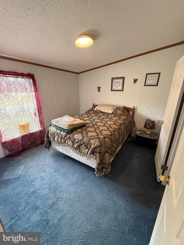 205 Jacob Dr, Moorefield, WV 26836 - bedroom with crown molding, carpet floors, and a textured ceiling