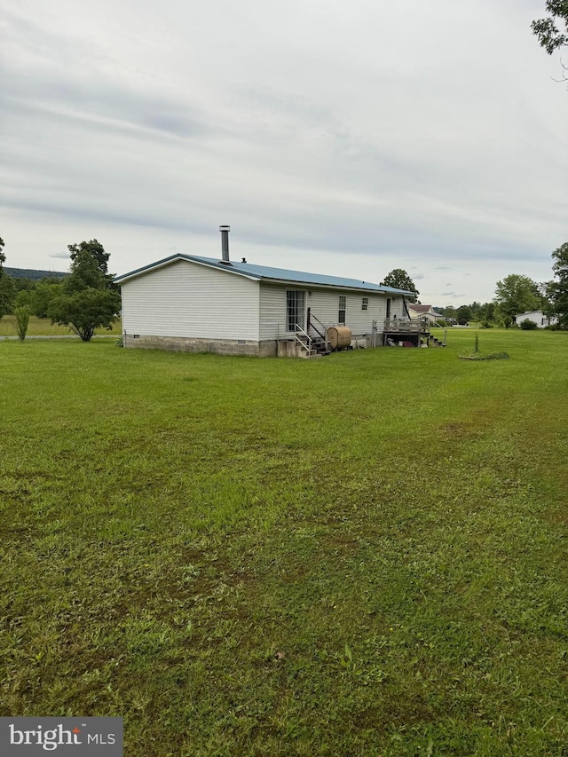 205 Jacob Dr, Moorefield, WV 26836 - rear view of property featuring entry steps and a yard