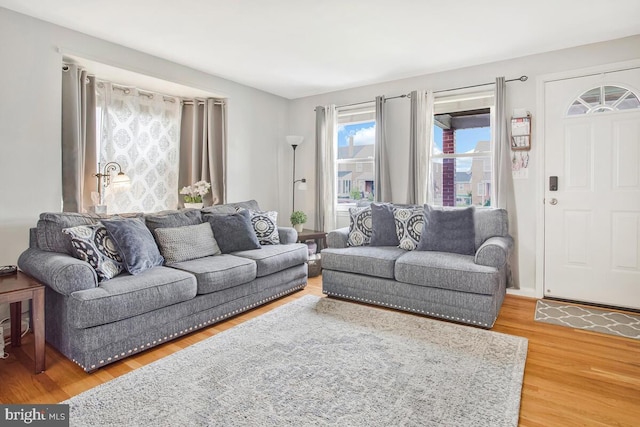 7215 Conley St, Baltimore, MD 21224 - living room with light wood finished floors
