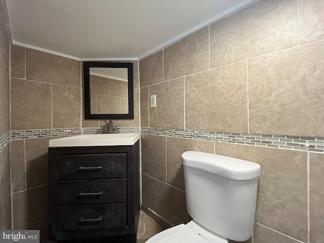 27 N 51st St, Philadelphia, PA 19139 - bathroom featuring vanity, tile walls, and toilet