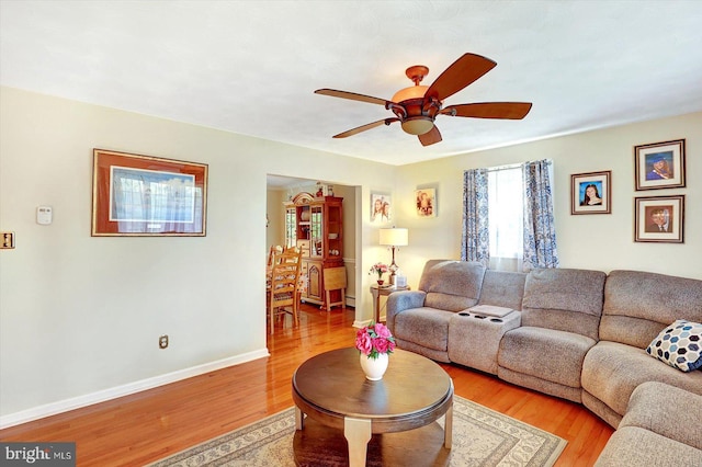 3476 Messersmith Rd, York, PA 17408 - living room featuring ceiling fan, light wood-style flooring, and baseboards