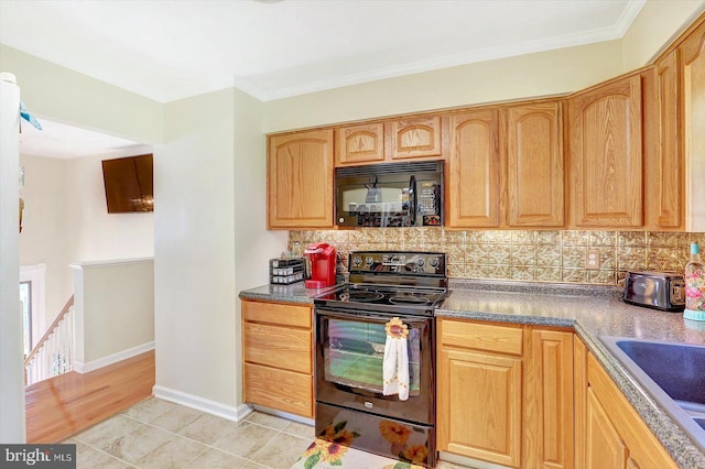 3476 Messersmith Rd, York, PA 17408 - kitchen featuring electric stove, black microwave, decorative backsplash, a sink, and light tile patterned floors