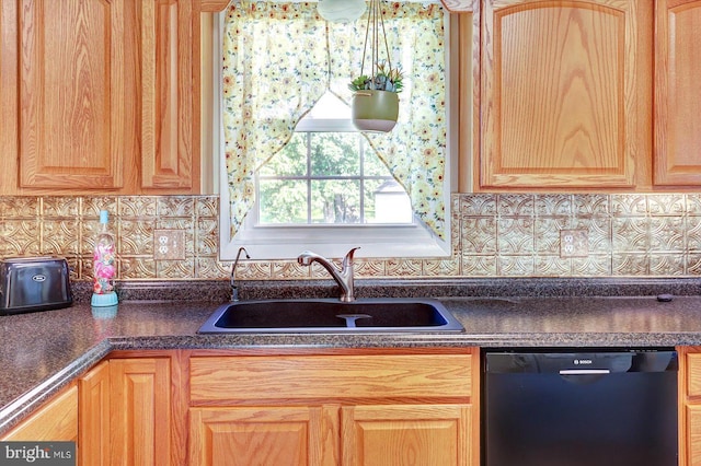 3476 Messersmith Rd, York, PA 17408 - kitchen with dishwasher, a sink, dark countertops, light brown cabinets, and backsplash