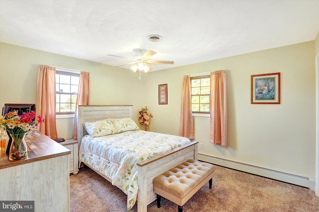3476 Messersmith Rd, York, PA 17408 - carpeted bedroom featuring a baseboard radiator and ceiling fan