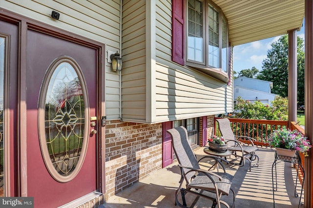 3476 Messersmith Rd, York, PA 17408 - entrance to property featuring covered porch and brick siding