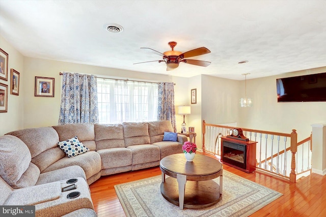 3476 Messersmith Rd, York, PA 17408 - living room featuring light wood-type flooring, a ceiling fan, and baseboards