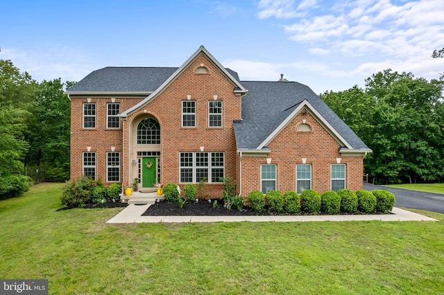 4300 Mountain Laurel Way, Brandywine, MD 20613 - view of front of property featuring brick siding, roof with shingles, and a front yard
