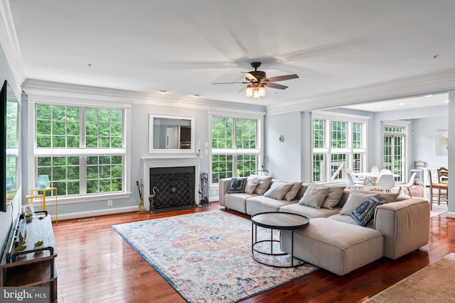 4300 Mountain Laurel Way, Brandywine, MD 20613 - living area featuring ornamental molding, hardwood / wood-style flooring, ceiling fan, and plenty of natural light