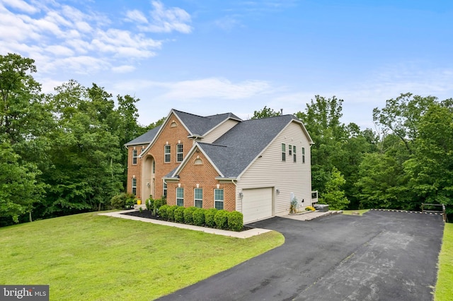 4300 Mountain Laurel Way, Brandywine, MD 20613 - traditional-style home featuring brick siding, roof with shingles, a front yard, driveway, and an attached garage