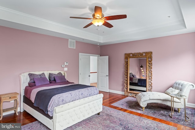 4300 Mountain Laurel Way, Brandywine, MD 20613 - bedroom with a raised ceiling, wood finished floors, ornamental molding, a ceiling fan, and baseboards