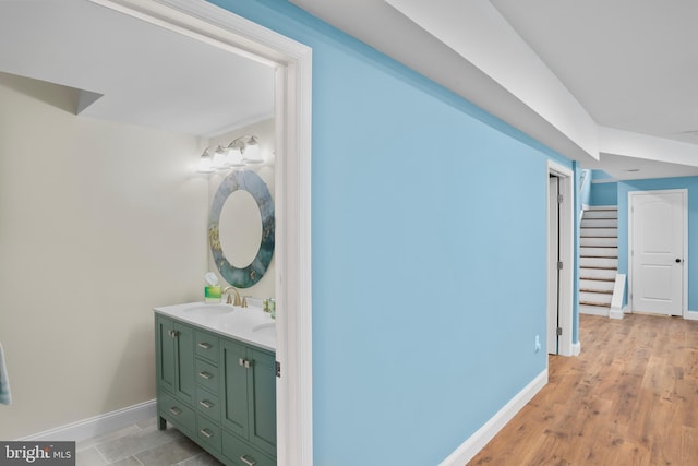 4300 Mountain Laurel Way, Brandywine, MD 20613 - full bath with double vanity, baseboards, and wood finished floors