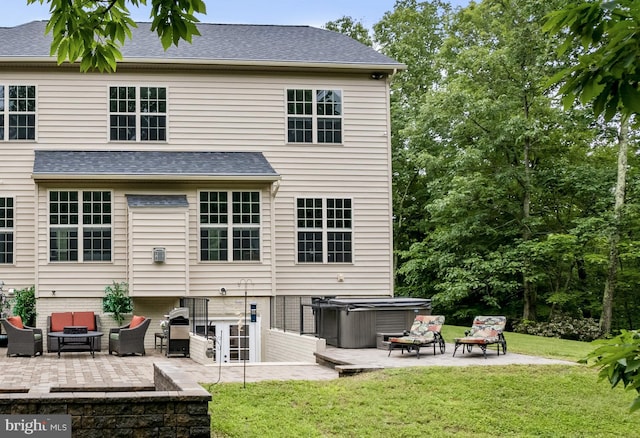 4300 Mountain Laurel Way, Brandywine, MD 20613 - back of property with a hot tub, a patio area, an outdoor living space, and a yard