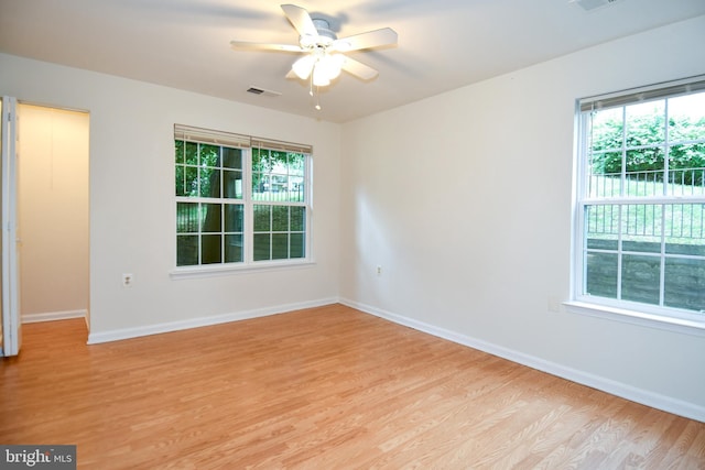 1031 Gardenview Loop Unit 103, Woodbridge, VA 22191 - unfurnished room featuring light wood finished floors and ceiling fan