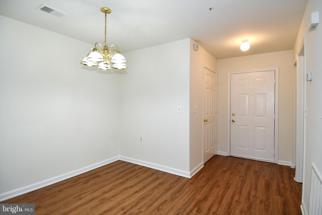 1031 Gardenview Loop Unit 103, Woodbridge, VA 22191 - unfurnished room with a chandelier and wood finished floors