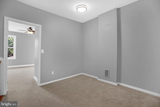 503 W 27th St, Baltimore, MD 21211 - carpeted spare room featuring ceiling fan and baseboards