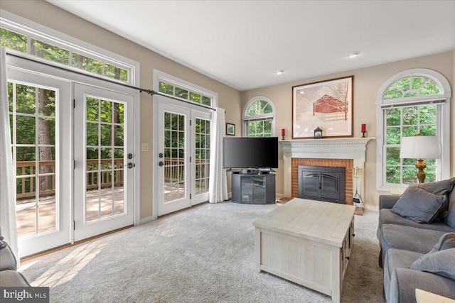1381 Sunwood Ter, Annapolis, MD 21409 - carpeted living area with a fireplace, baseboards, and recessed lighting