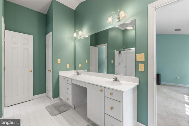 1381 Sunwood Ter, Annapolis, MD 21409 - full bathroom with double vanity, baseboards, tile patterned floors, and a shower with shower door