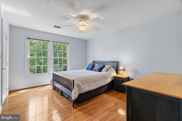1381 Sunwood Ter, Annapolis, MD 21409 - bedroom with light wood-style flooring, a ceiling fan, and baseboards